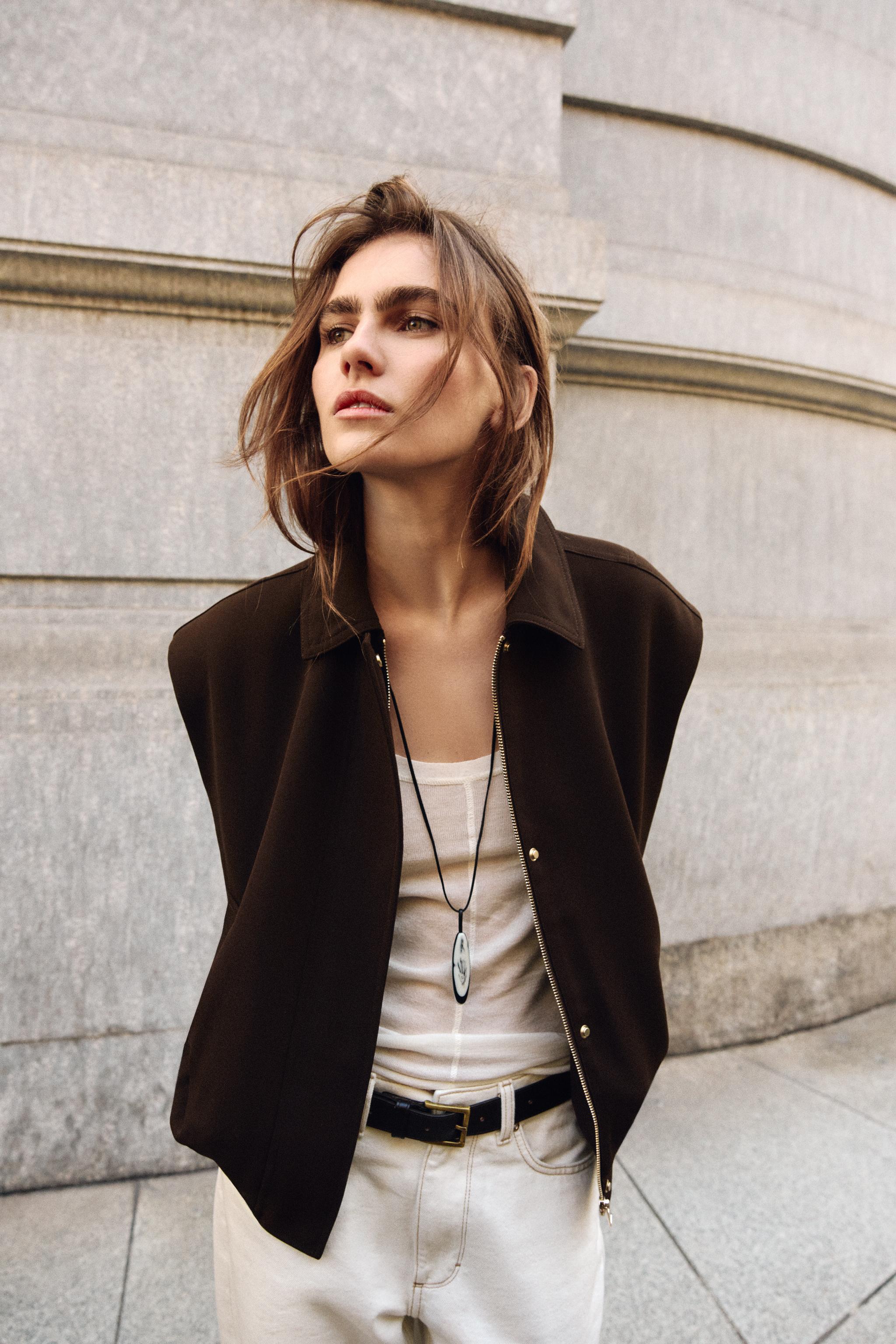 GILET À ÉPAULETTES AVEC BAS ÉLASTIQUE